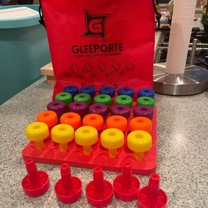 Pegboard, pegs, and carrying drawstring bag
